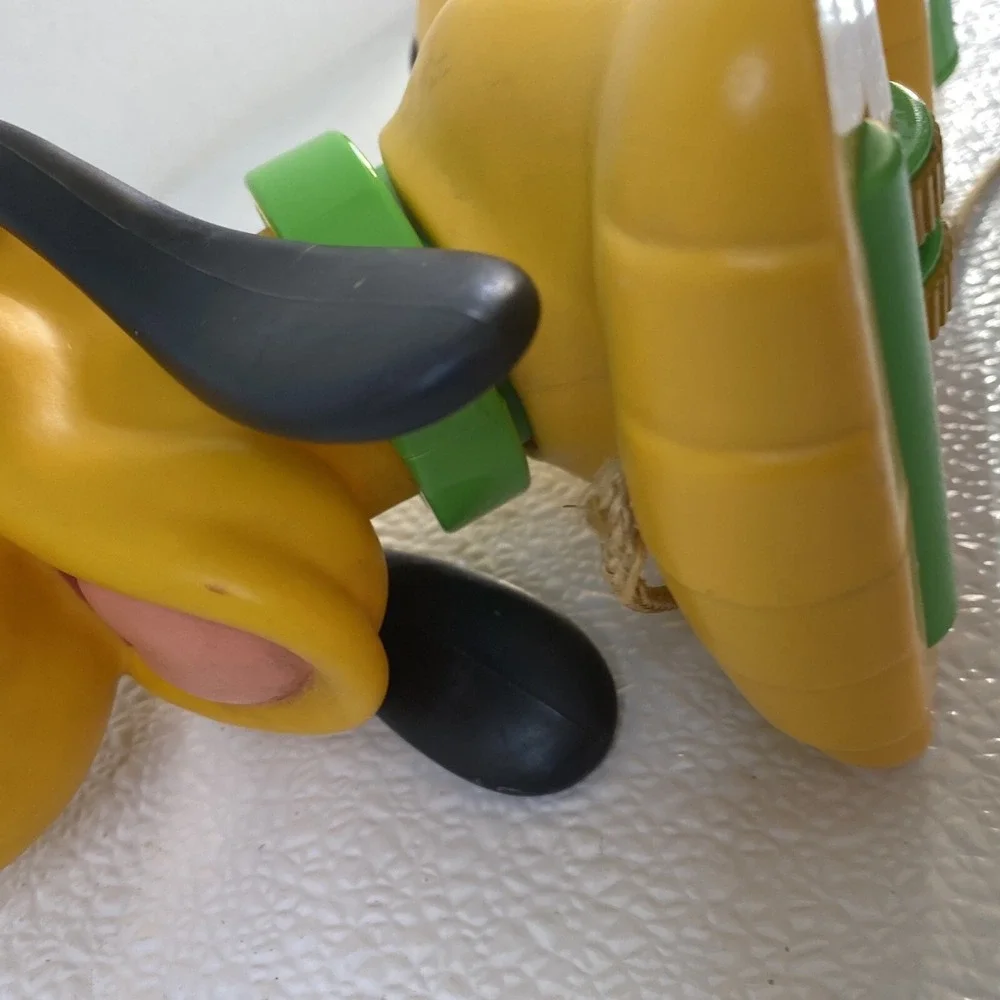 Vintage Disney Pluto Pull Toy Yellow Plastic Rolling Dog Mickey Mouse Friends